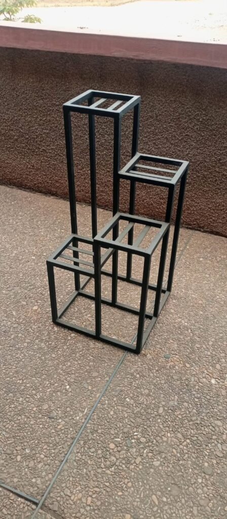 Four-tier stepped cube black metal plant stand